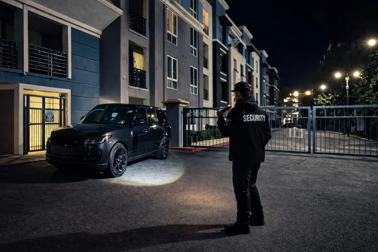 Security guard with patrol vehicle