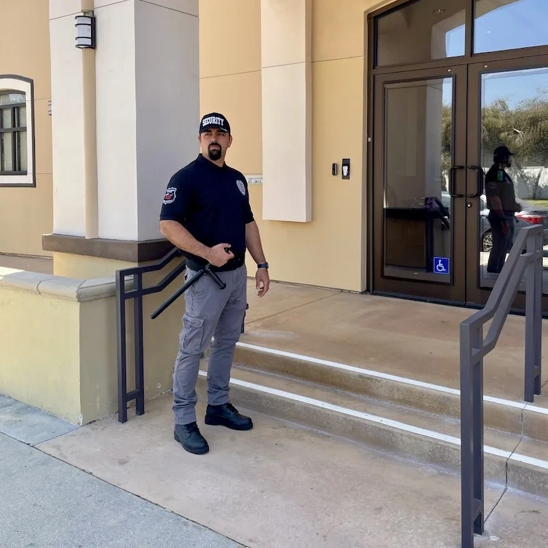 Security guard consulting with client